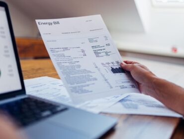 Household comparing energy bills and electricity tariffs